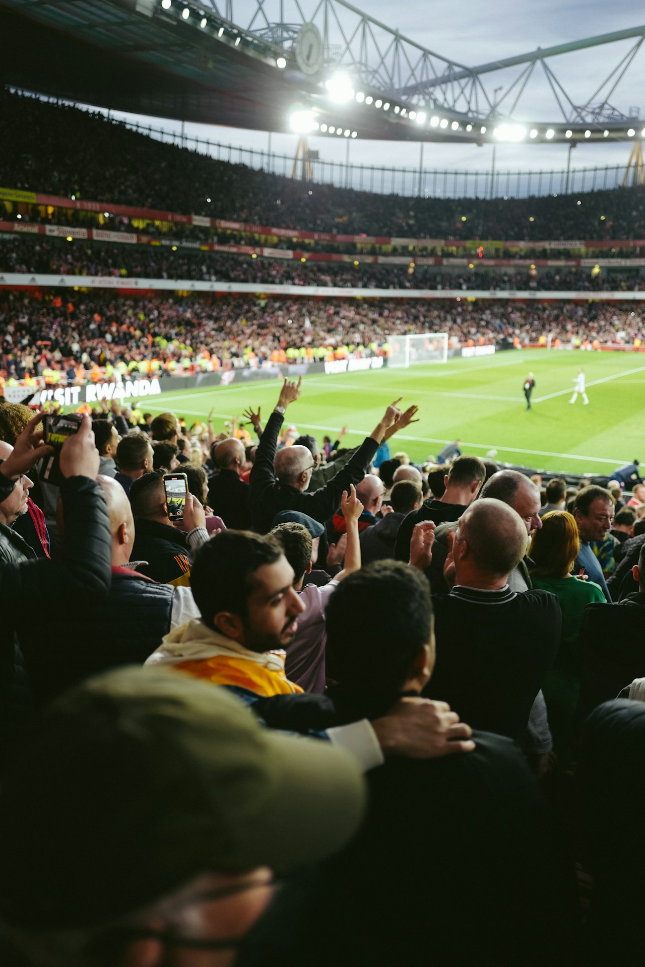 Fans celebrating a goal in a packed stadium during World Cup 2026