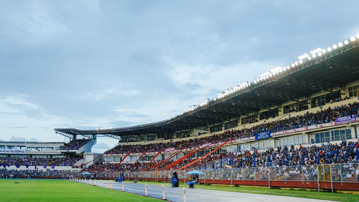 Fans fill a stadium for a decisive group-stage match